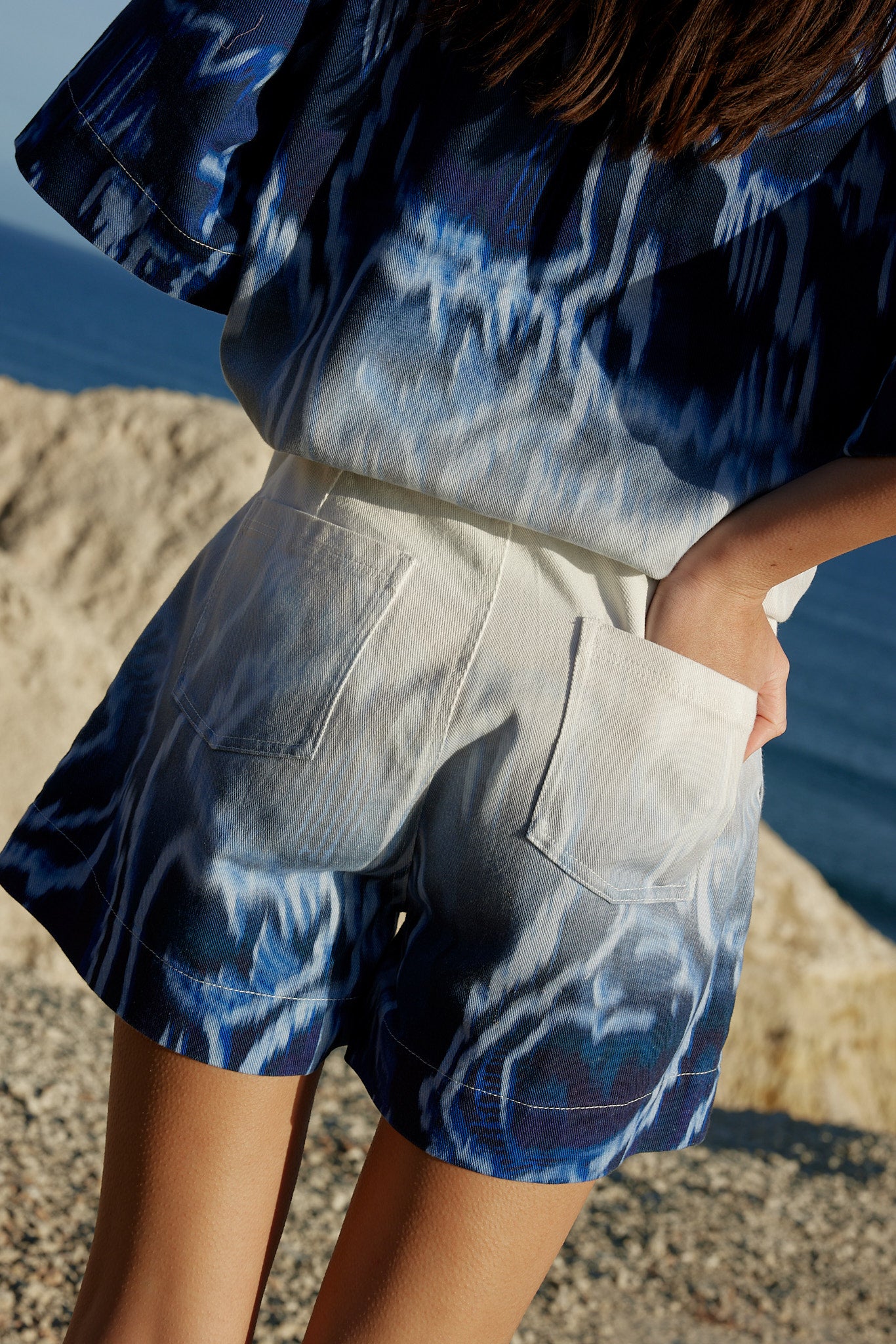 MELIK SHORTS IN OCEAN DEPTH/FOAM